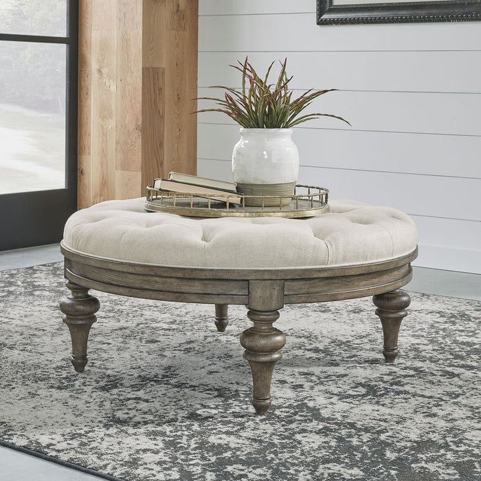 Liberty Furniture Americana Farmhouse Round Cocktail Ottoman in Dusty Taupe